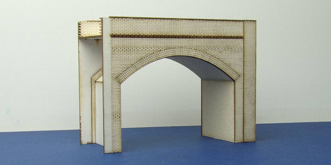 A 00-04 OO gauge single brick viaduct Single width brick viaduct which can accommodate double track though the opening.
